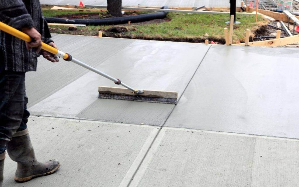 Reef Concrete Contractor Richardson's Staff working on a Concrete Driveway project in Richardson TX