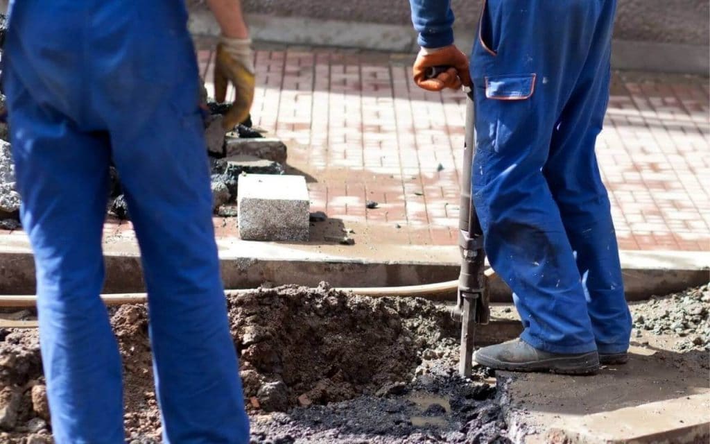 Reef Concrete Contractor Richardson's Staff working on a Concrete Repair project in Richardson TX